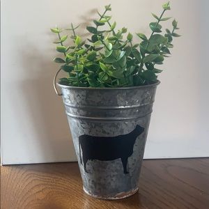 Galvanized bucket with cow and greenery farmhouse